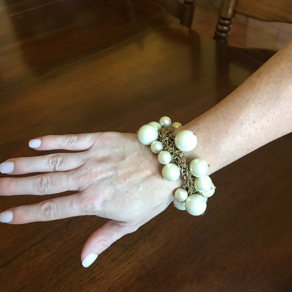 J Crew Large Faux pearls. Gold bracelet with dangling gold fringe. Signed.
